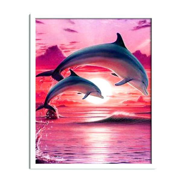 Delfines en la puesta de sol